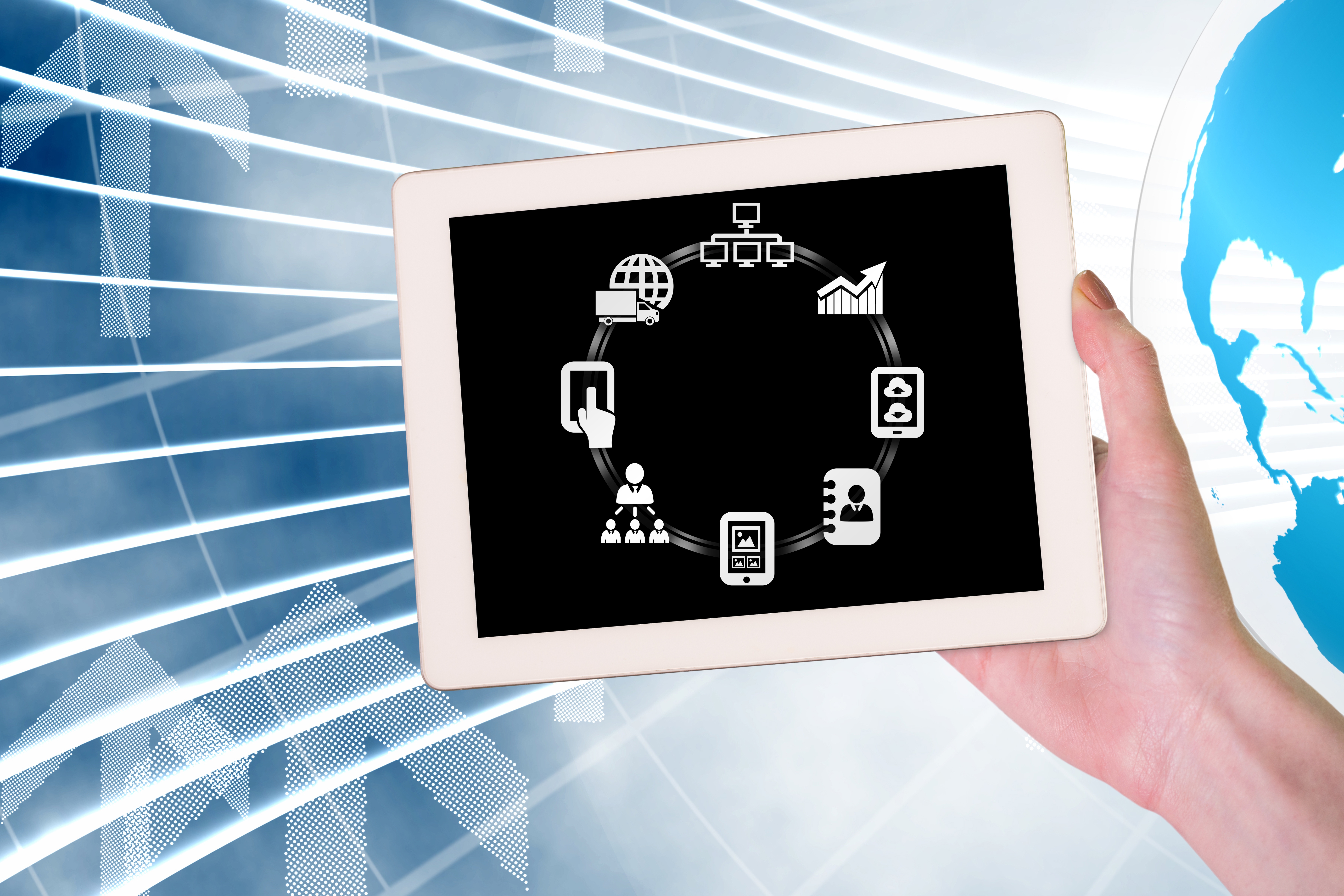 Tablet displaying digital icons representing data, cloud, and networking concepts in a tech environment.